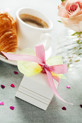 Decorated gift box and flowers