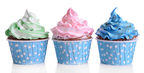 Delicious cupcakes isolated on white