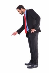 Obraz na płótnie Canvas Businessman in suit pointing finger