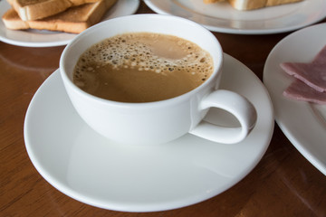  coffee with Breakfast on table