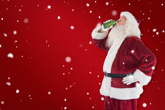 Composite image of father christmas drinks beer with closed eyes
