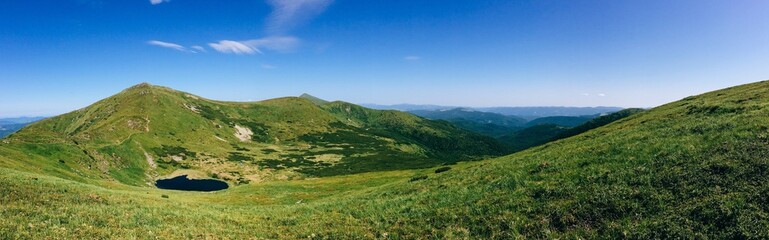 Sunny day in mountain lake