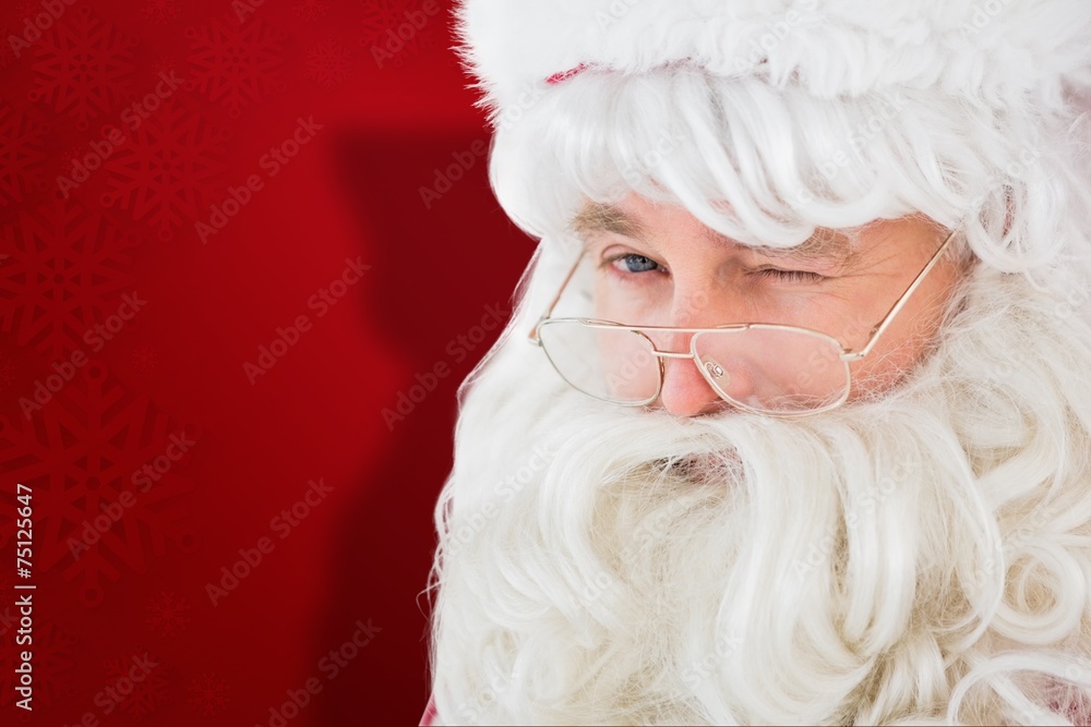 Poster composite image of portrait of santa claus winking