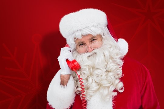 Composite image of santa claus on the phone