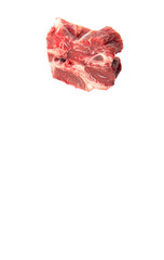 Chunk of cut frozen beef meat over white background 