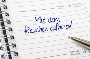 Terminkalender mit dem Eintrag Mit dem Rauchen aufhören
