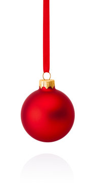 Red Christmas ball hanging on ribbon Isolated on white backgroun