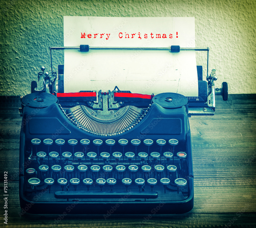 Fototapete old typewriter with sample text wish list