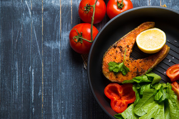 Grilled fish steak with vegetables