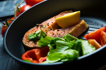 Grilled fish steak with vegetables