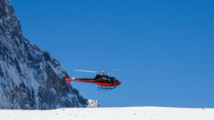 Lifeguard helicopter in Himalaya mountains in Nepal