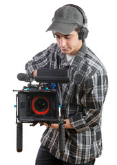Obraz premium young cameraman with professional camera