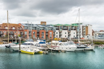 Fototapeta na wymiar Yachts in harbor in Portsmouth