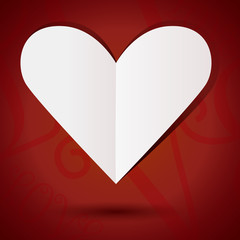 Abstract paper heart on red background