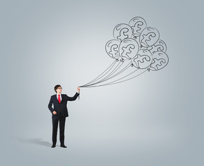 businessman with money balloons