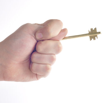 Ключ в руке с жестом фига