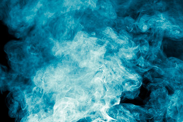 Fototapeta na wymiar blue smoke on black background