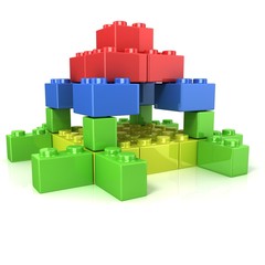 Fototapeta premium Toy for children, colorful castle construction isolated on white