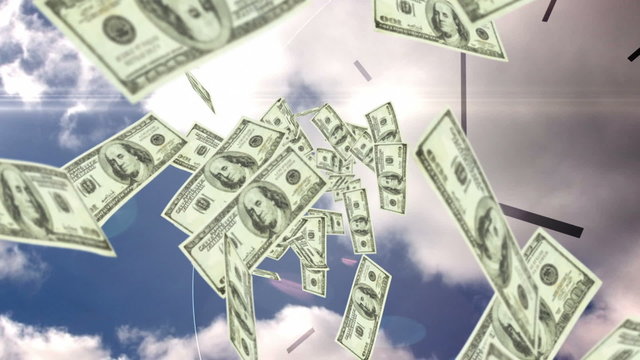 Dollar bills falling with over sky background