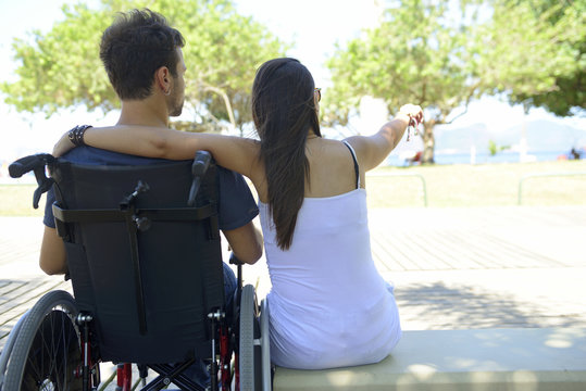man in wheelchair and girlfriend