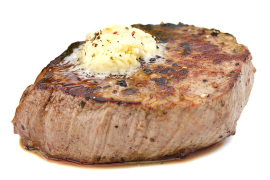 Roast pork tenderloin fillet steak, with melting butter.
