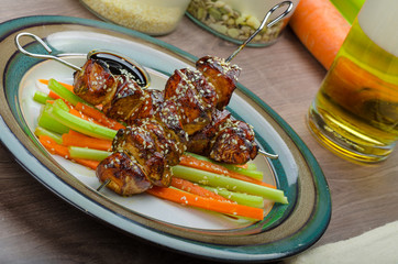 Sticky teriyaki chicken skewers with crunchy slaw