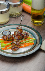 Sticky teriyaki chicken skewers with crunchy slaw