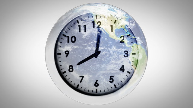 Clock ticking against the earth