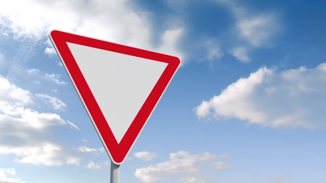 Red and white road sign over cloudy sky
