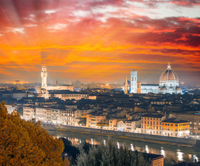 Fototapeta na wymiar Florence (Firenze) sunset skyline with Palazzo Vecchio and Duomo