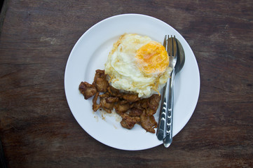 Pork fried garlic and fried egg