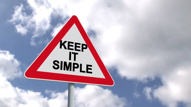 Keep it simple sign against blue sky