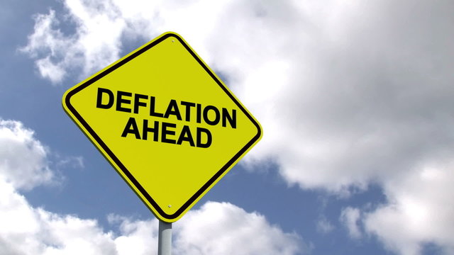 Deflation ahead sign against blue sky