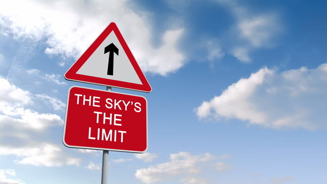 The skys the limit sign against blue sky