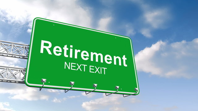 Retirement next exit sign against blue sky