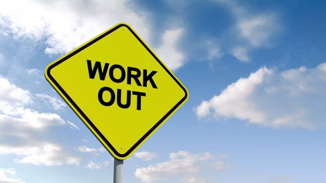 Work out sign against blue sky