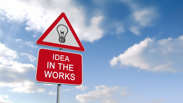Idea in the works sign against blue sky
