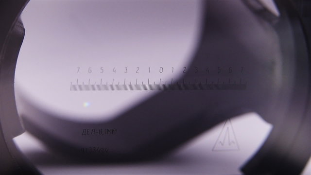Glass with scale. One division is equal to 0.1 mm