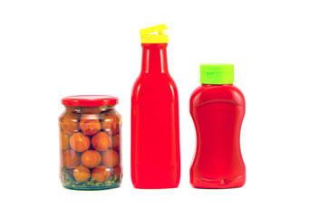 two plastic tomato ketchup bottle and potted vegetable glass jar