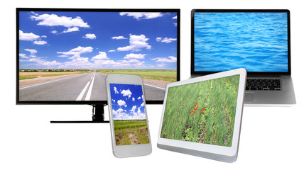 Monitor, laptop, tablet and phone with nature wallpaper