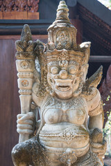 Stone sculpture in Bali style on entrance door