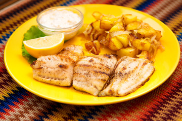the perch fish grill  with sauce and vegetable