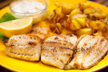 the perch fish grill  with sauce and vegetable