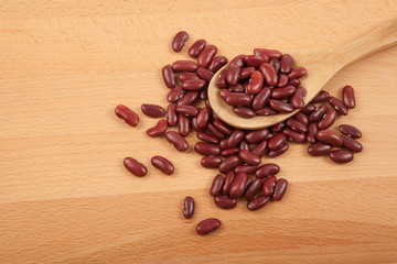 Red kidney beans with wooden spoon