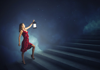 Obraz na płótnie Canvas Woman with lantern