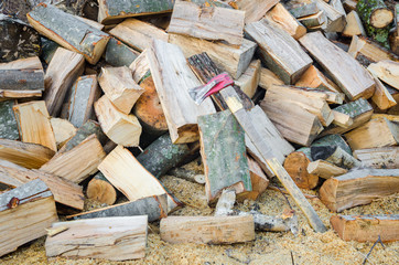 Chopped wood and axe