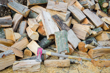 Chopped wood and axe