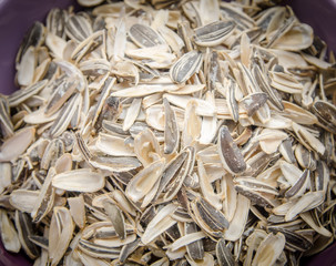Sunflower seeds husk in a pile in a bowl
