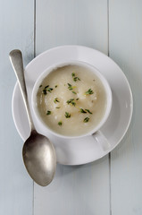 cup with creamy cauliflower soup