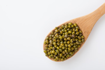 Mung beans with wooden spoon